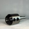 cnc tool holder in front of a off white background for sale